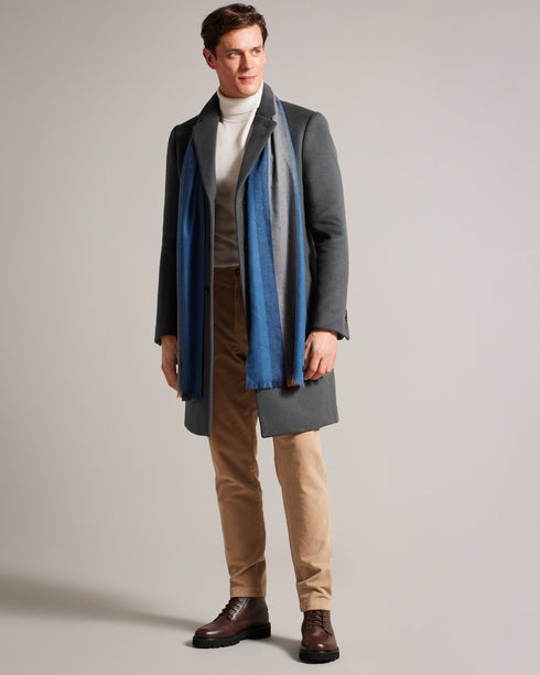 ALFREDY-Scarves-ALFREDY keeps you cosy with ease. This wardrobe staple is ready for action, whether you're jetting off for a weekend away or heading to the office. A striped design means its sure to look cool whatever the weather, and its woven knit is perfect for whipping round your shoulders when the wind picks up.The fabric of this product is made with 65% recycled polyester. Using recycled polyester helps divert plastic waste from ending in landfills. Scarf Woven knit Striped Fringed edge Ted Baker bran